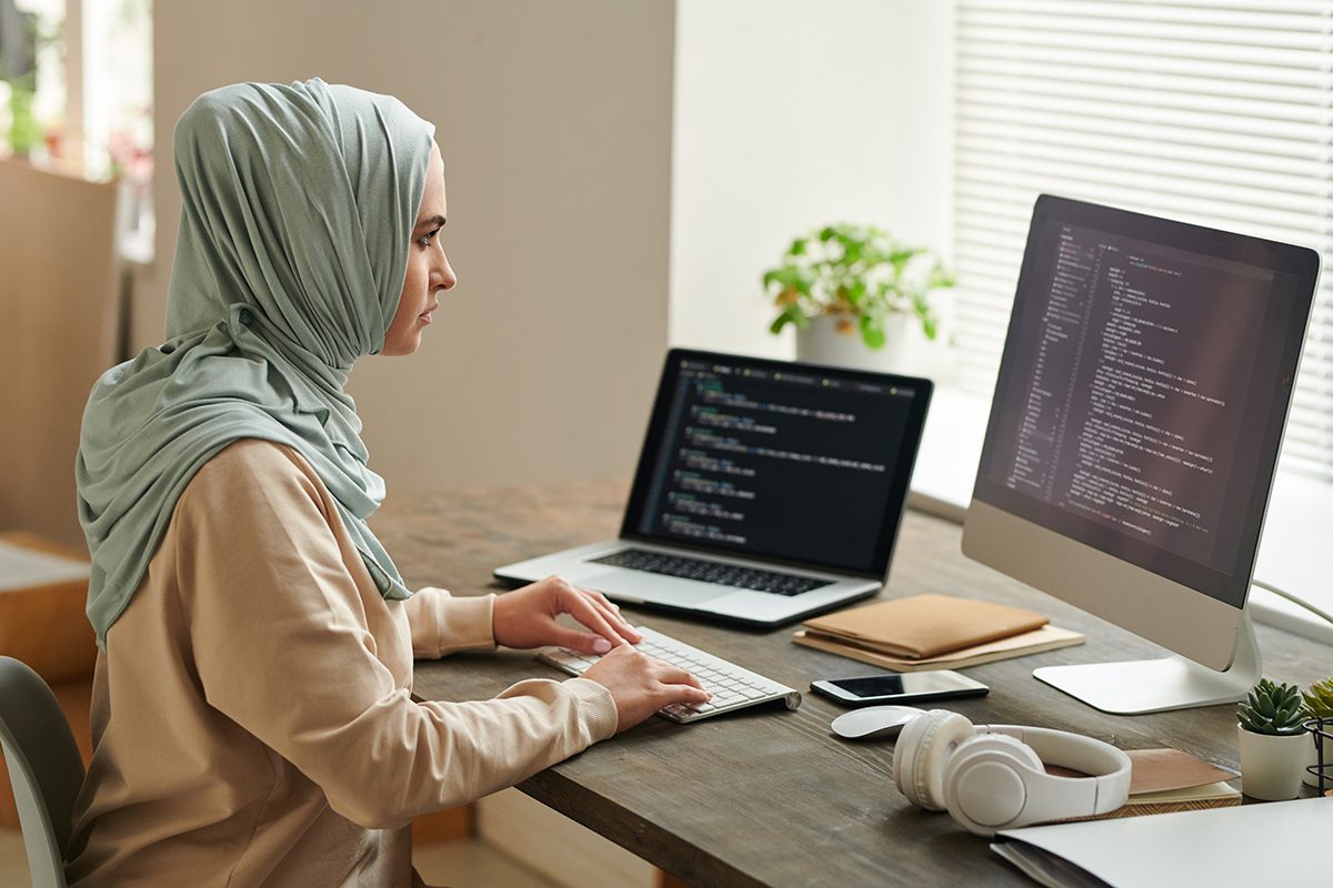 https://www.worksaversystems.com/wp-content/uploads/2023/11/successful-middle-eastern-woman-wearing-light-blue-hijab-sitting-desk-working-computer-code-freepik.jpg